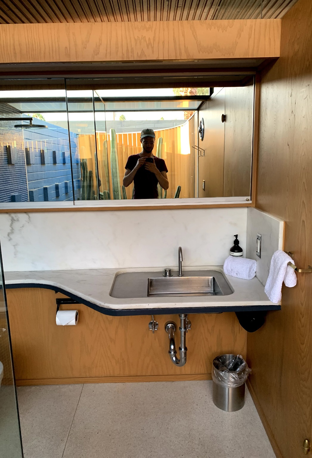 Bath 1, rehabilitated original countertop, medicine cabinet and wood fascia